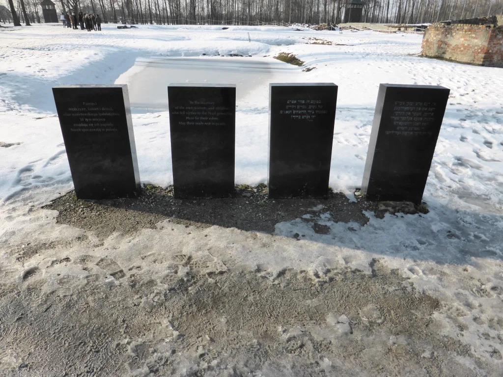 To the memory of the men, women, and children who fell victim to the Nazi genocide. Here lie their ashes. May their souls rest in peace.